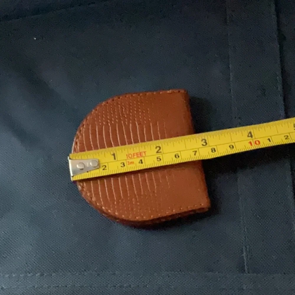 Handcrafted tan leather coin purse horseshoe shape for easy access to change